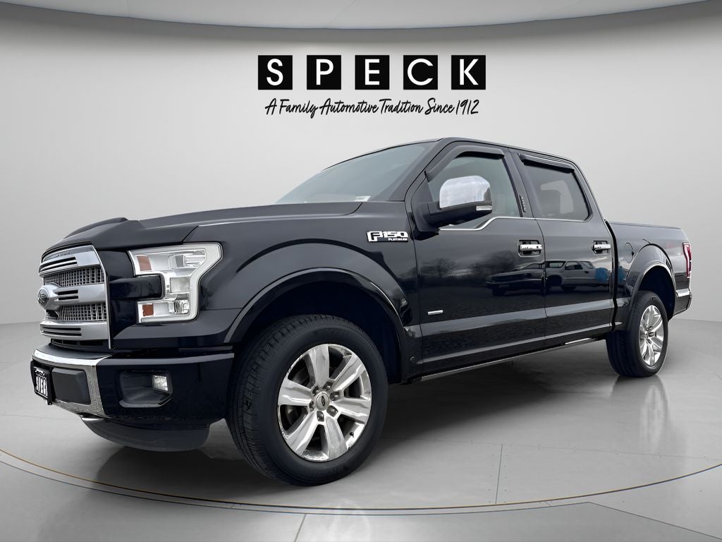2016 Ford F-150 Platinum in Shadow Black — front three-quarter view