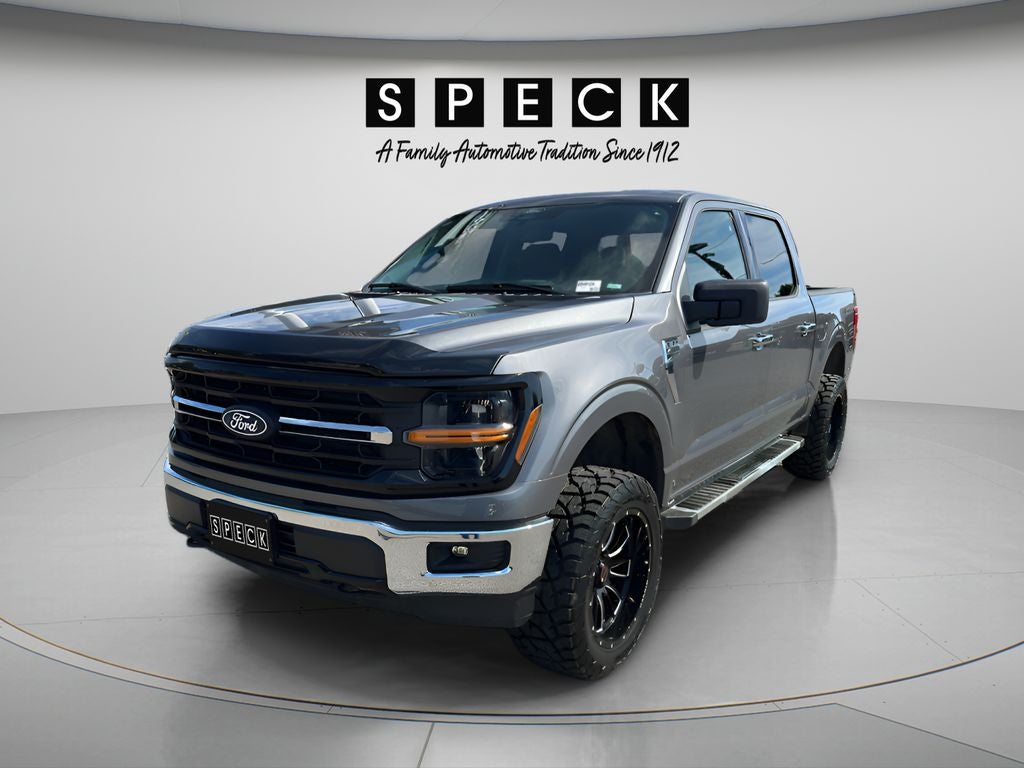 2025 Ford F-150 XLT in Carbonized Grey Metallic — front three-quarter view