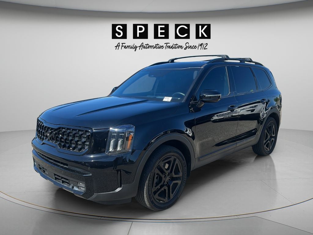 2025 Kia Telluride SX in Ebony Black — front three-quarter view