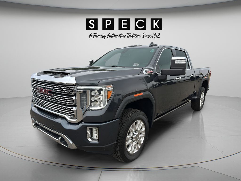 2022 GMC Sierra 3500 HD Denali in Hunter Metallic — front three-quarter view