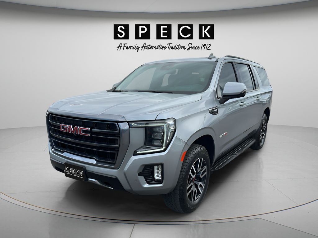 2024 GMC Yukon XL AT4 in Sterling Metallic — front three-quarter view