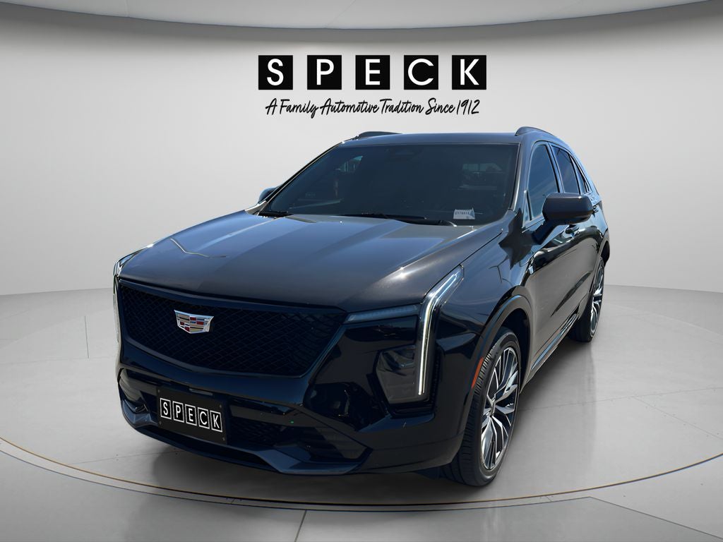 2024 Cadillac XT4 Sport in Stellar Black Metallic — front three-quarter view