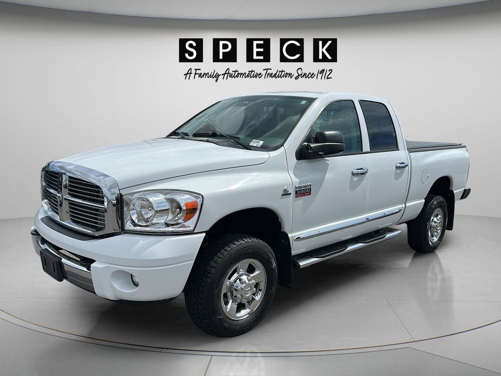 2009 Dodge Ram 3500 Laramie in White — front three-quarter view