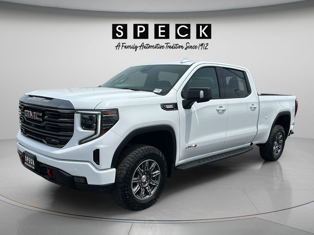 2024 GMC Sierra 1500 AT4 in Summit White — front three-quarter view