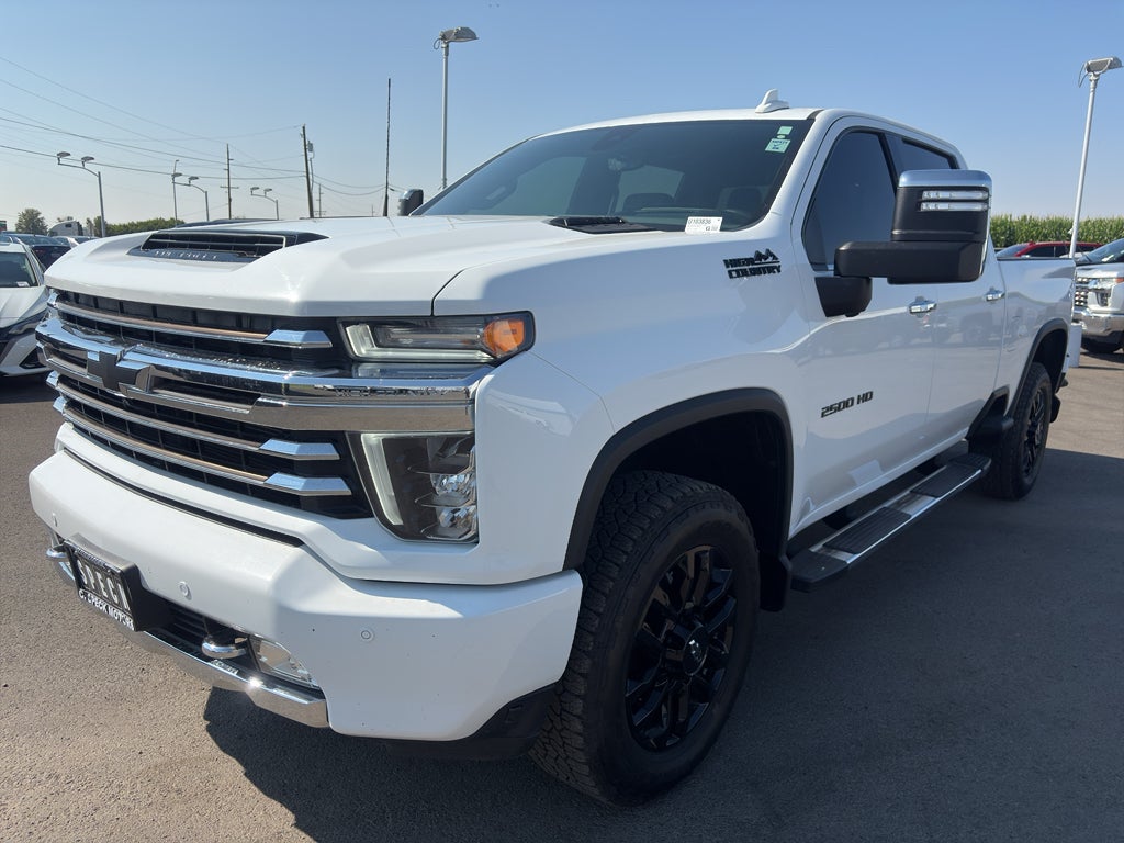 2023 Chevrolet Silverado High Country in Summit White — front three-quarter view