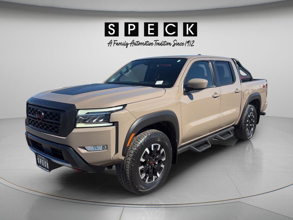 2023 Nissan Frontier Crew Cab PRO-4X 4x4 in Baja Storm — front three-quarter view