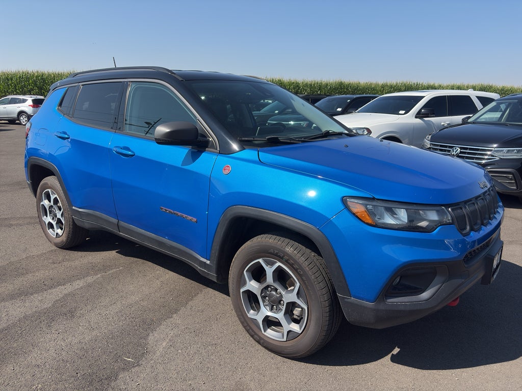 2022 Jeep Compass Trailhawk 4x4 in Laser Blue Pearlcoat — front three-quarter view