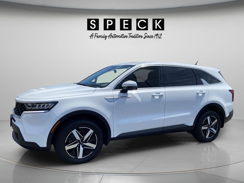 2023 Kia Sorento LX in Glacial White Pearl — front three-quarter view