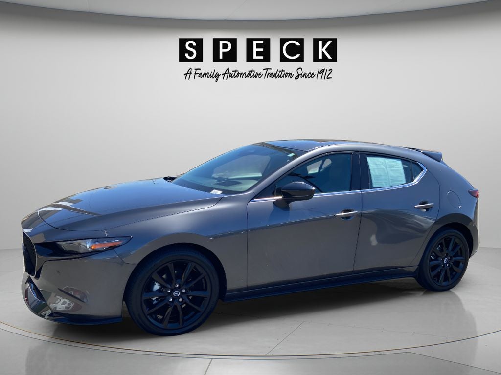 2024 Mazda Mazda3 Hatchback 2.5 Turbo Premium Plus in Machine Gray Metallic — front three-quarter view