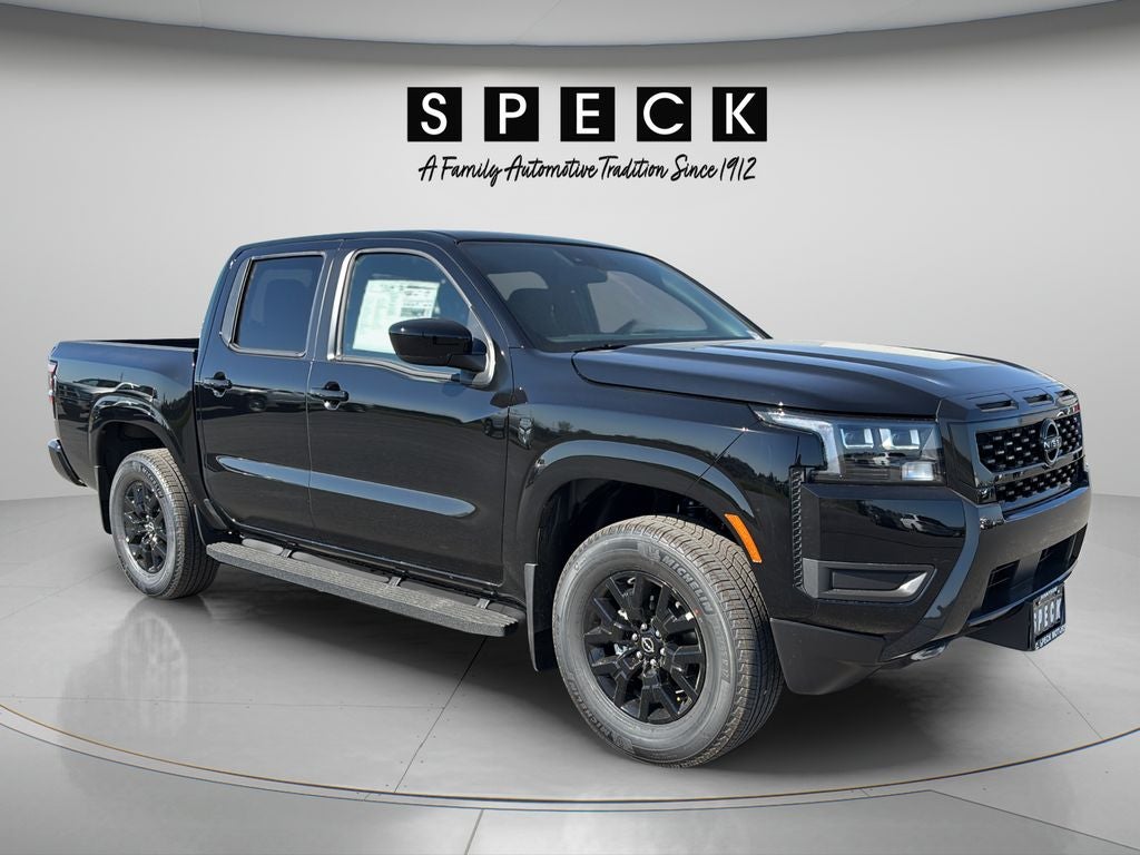 2026 Nissan Frontier Crew Cab SV in Super Black — front three-quarter view