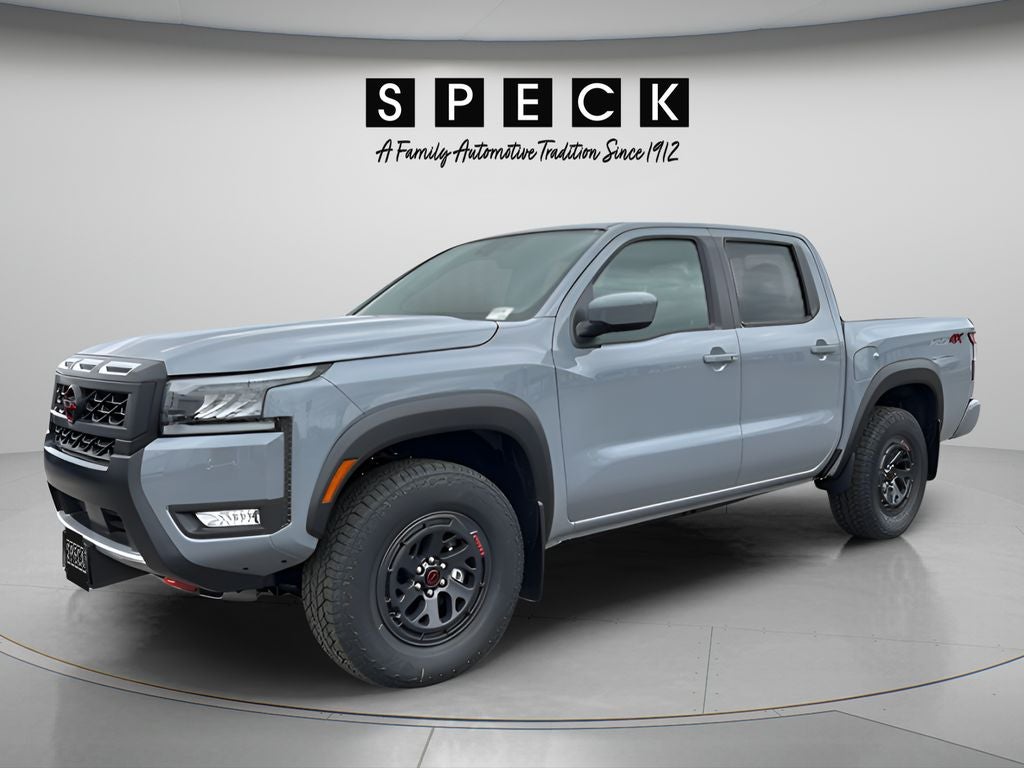 2026 Nissan Frontier Crew Cab PRO-4X in Boulder Gray Pearl — front three-quarter view