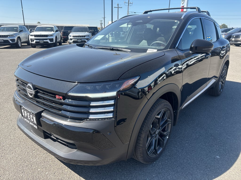 2026 Nissan Kicks SR in Super Black — front three-quarter view